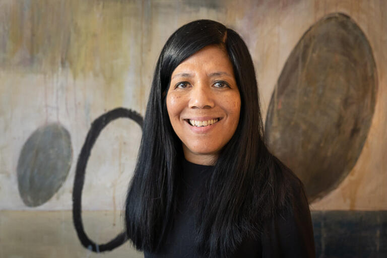 Person looking into camera smiling