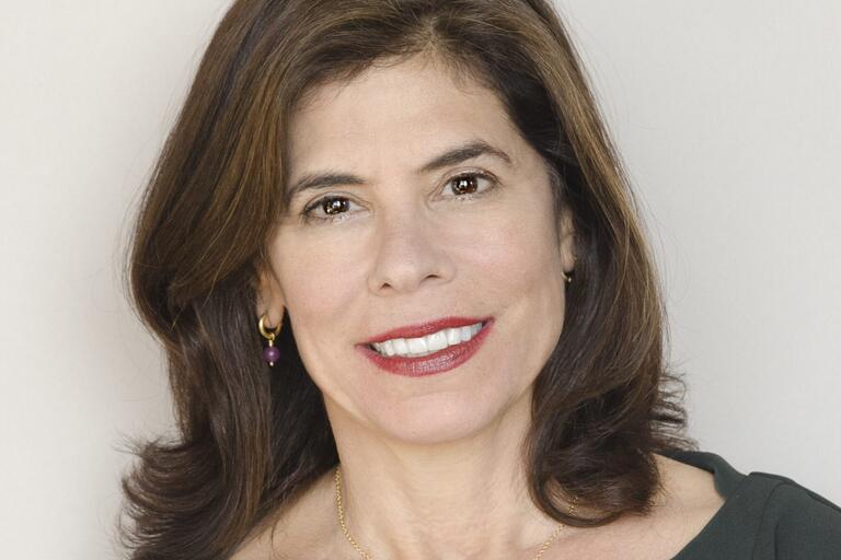 Person looking into camera smiling