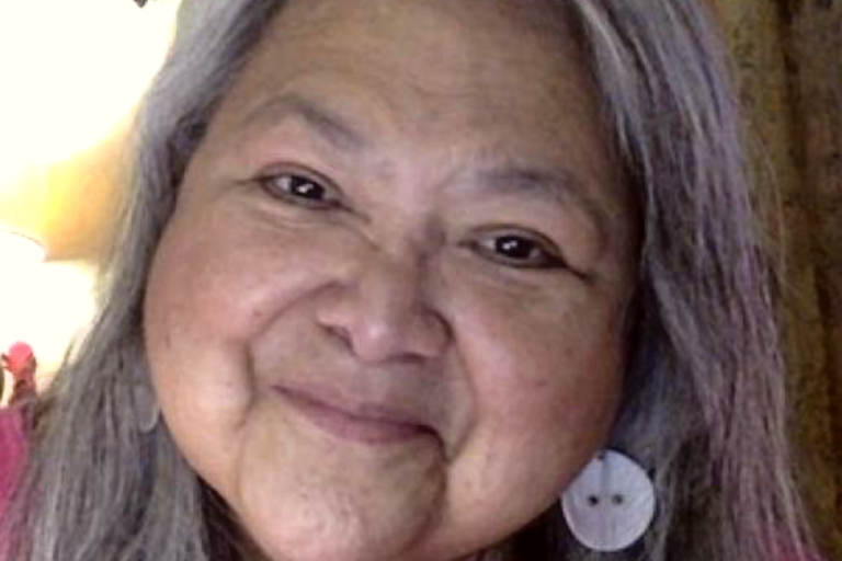 Woman smiling into camera