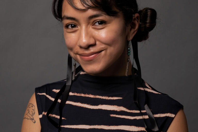 Person looking into camera smiling