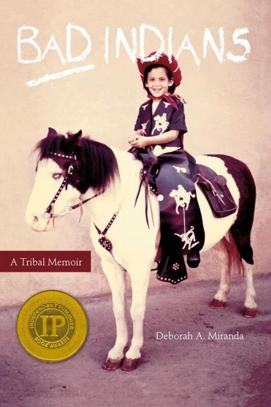 Cover of the book "Bad Indians: A Tribal Memoir" by Deborah A. Miranda displaying an award badge for the Independent Publisher Book Award on the bottom left corner, featuring a black and white pony with decorative bridle and saddle, and an individual in a
